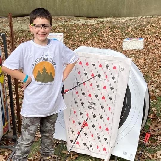 CoFAS camp 2022 boy with bullseye