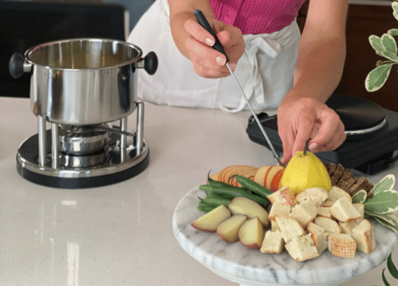 Preparing fruit to dip in fondue