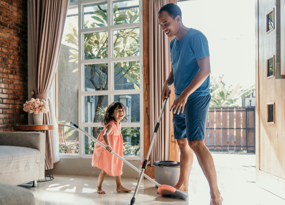 dad and daughter cleaning