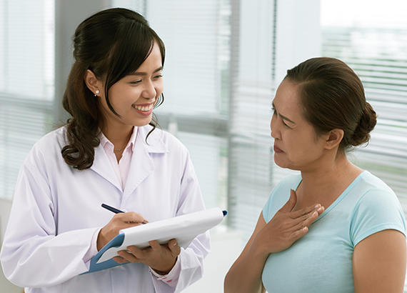 Woman talking to a doctor