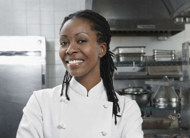 Chef smiling in kitchen
