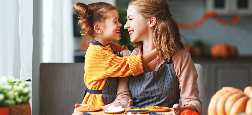 mom and daughter cooking